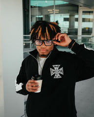 Black “Quarter” zip Jacket